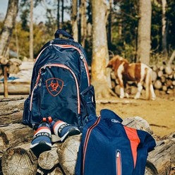 Ariat back pack blue with red trim